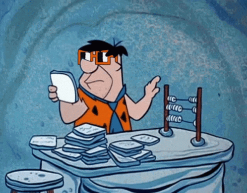 Fred Flintstone As An Accountant GIF