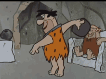 Fred Flintstone In Bowling Alley GIF