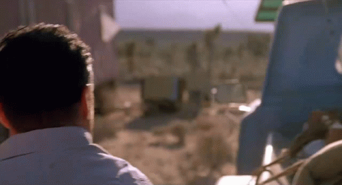 Fred Ward Putting His Things At Trunk GIF