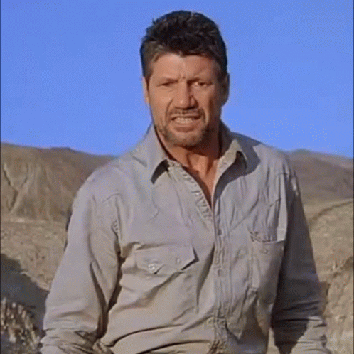 Fred Ward Serious Look GIF