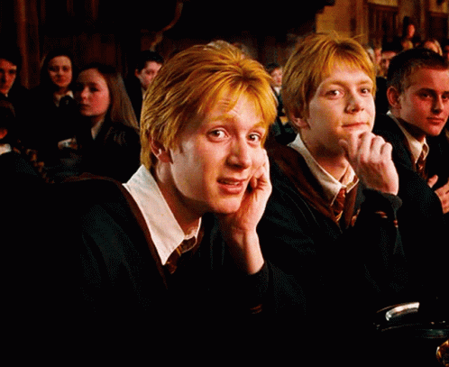Fred Weasley Hands On Chin GIF