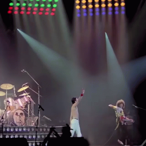 Freddie Mercury and Queen Perform on Stage