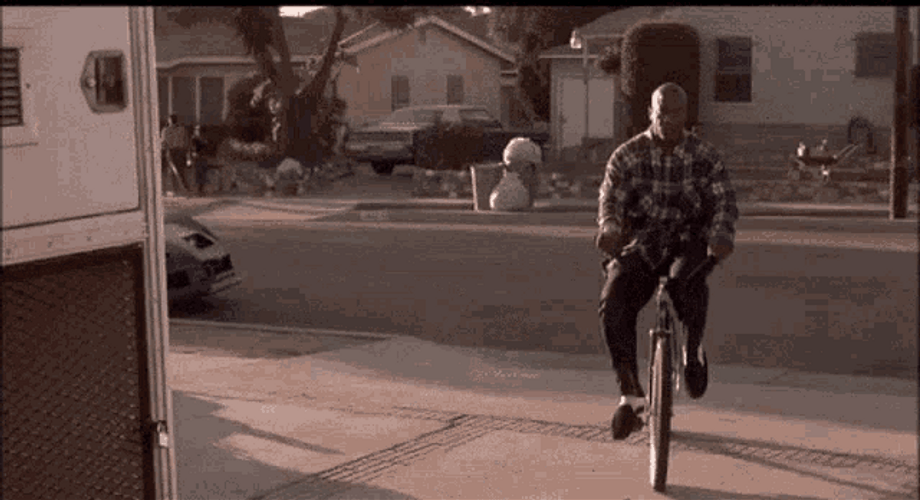 Friday Movie Serious Deebo Riding His Bike GIF