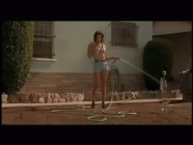 Friday Movie Sexy Mrs. Parker Watering Her Plants GIF
