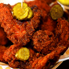 Fried Chicken With Pickles On A Stick In A Basket GIF