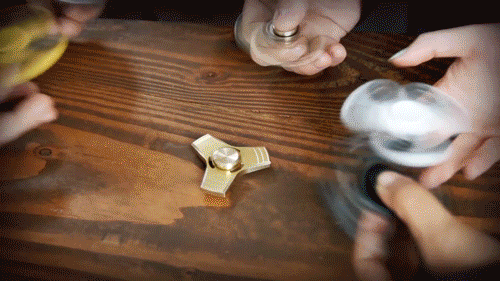 Friends Playing Fidget Spinner GIF