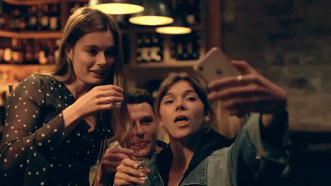 Friends Take Selfie And Two Shots Of Vodka GIF