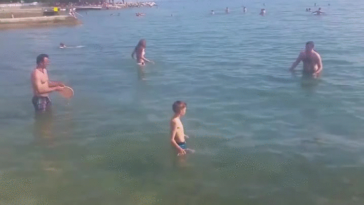 Frisbee Fun At Sea GIF