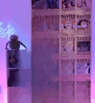 Frog Sitting on Shelf in Front of Wanted Posters