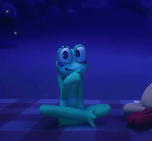 Frog With Purple Bow Tie Sitting on Floor