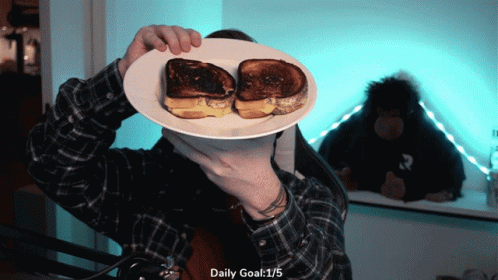 Frustrated Vlogger Bread Falling Over GIF