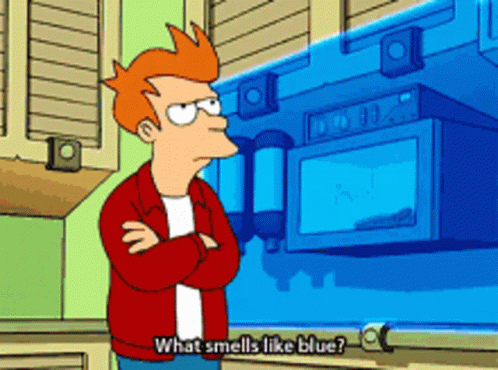 Fry From Futurama Stands In Front Of A Blue Microwave And Says What Smells Like Blue GIF