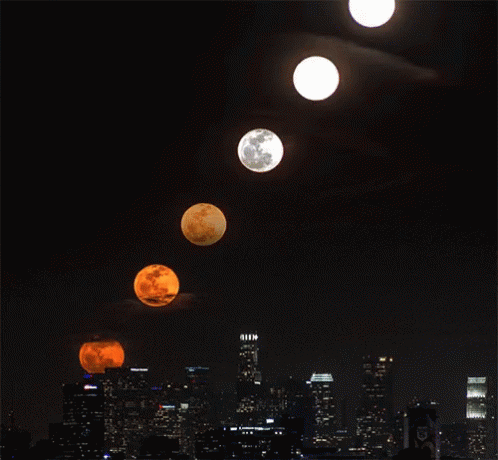 Full Moon Above City Skyline