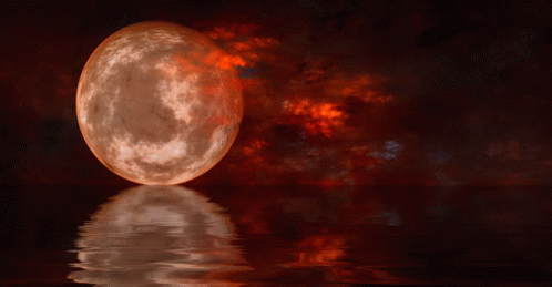 Full Moon Reflected in Water With Red Sky
