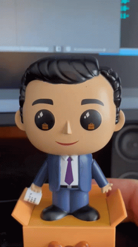 Funko Pop In Suit And Tie Holding Receipt GIF