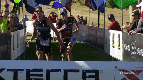 Funny Athlete Sliding To Finish Line GIF