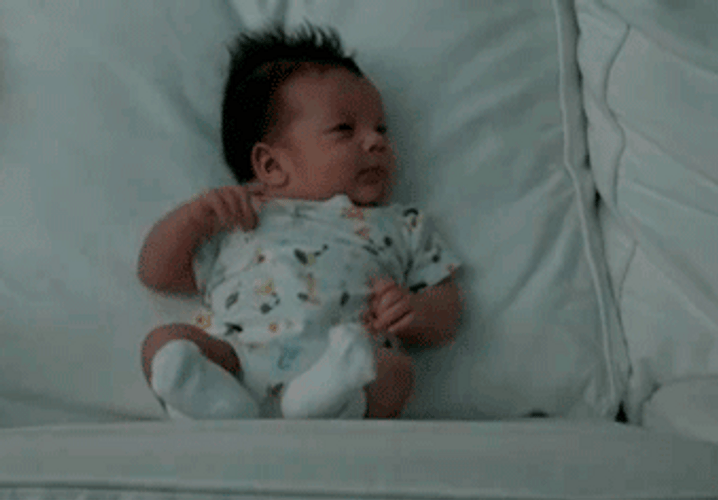 Funny Baby Falls After Sneezing GIF