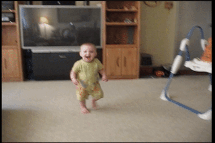 Funny Baby Knocked Down By Cat GIF