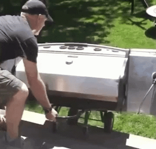 Funny Bbq Grill Topples Over Mishap GIF