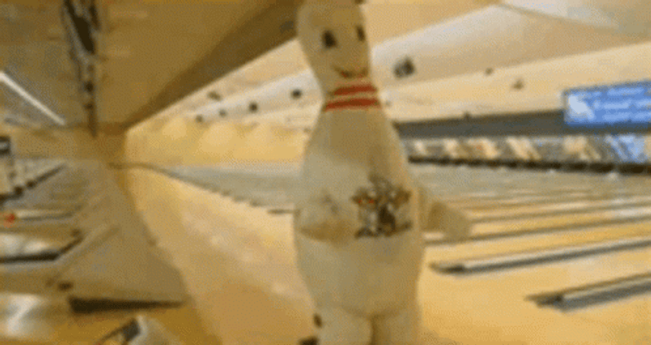 Funny Bowling Pin Mascot Chasing Players GIF