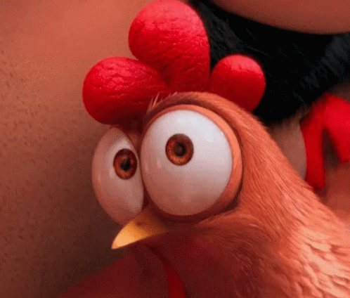Funny Cartoon Chicken Squinting GIF