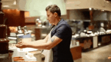 Funny Chef Washing Face On Chocolate Fountain GIF