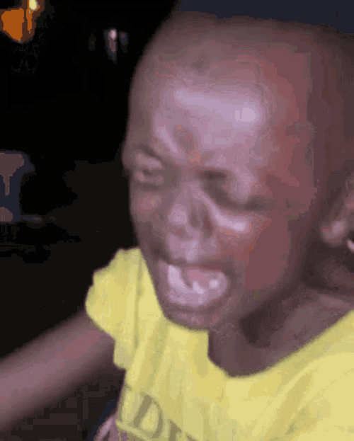 Funny Crying To Laughing African Small Guy GIF