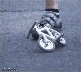 Funny Cyclist Riding Small Bicycle GIF