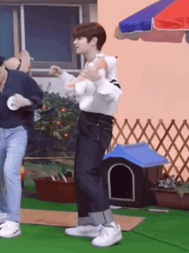 Funny Dancing Asian Boy Holding Teddy Bear GIF