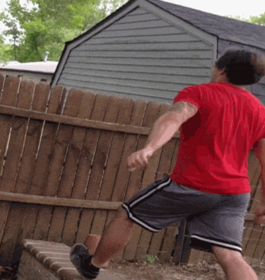 Funny Falling In The Fence GIF