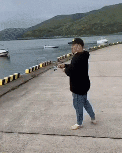 Funny Fishing Man Fall On The Water GIF