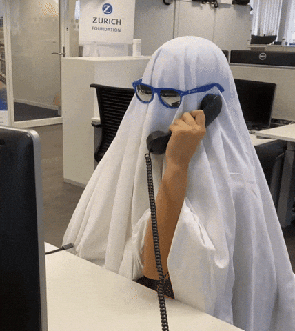 Funny Ghost In An Office Answering Calls GIF