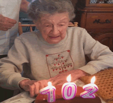 Funny Grandma Blowing Candles Denture Fail GIF