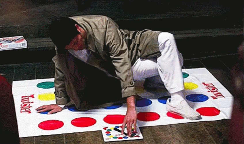Funny Guy Playing Color Twister Game Alone GIF