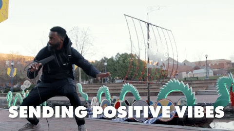 Funny Guy Sending Positive Vibes GIF