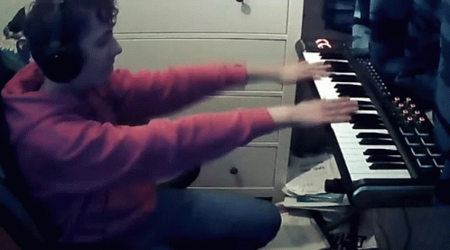 Funny Guy Tapping Piano GIF