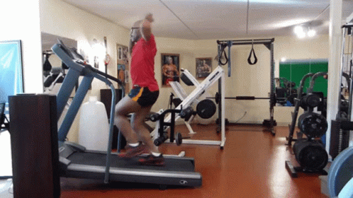 Funny Guy Walking On Treadmill GIF