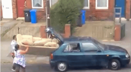 Funny Guys Moving Sofa GIF