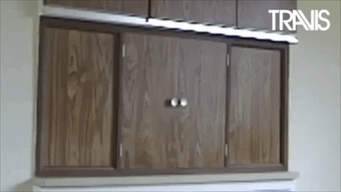 Funny Happy New Year Cupboard Surprise GIF