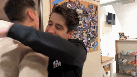 Funny Hug Eyes Blaring Brother Hug GIF