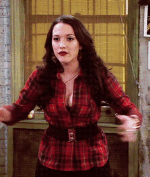 Funny Kat Dennings Holding Chest GIF