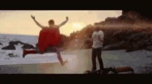 Funny Kick In The Nuts Guy Flying GIF