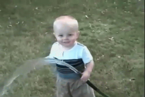 Funny Kid Drinking From A Fire Hose Fail GIF