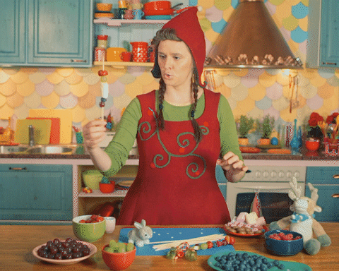 Funny Lady Santa Baking GIF
