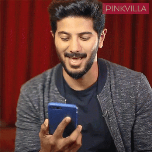 Funny Laughing Dulquer Salmaan Watching Online Videos GIF