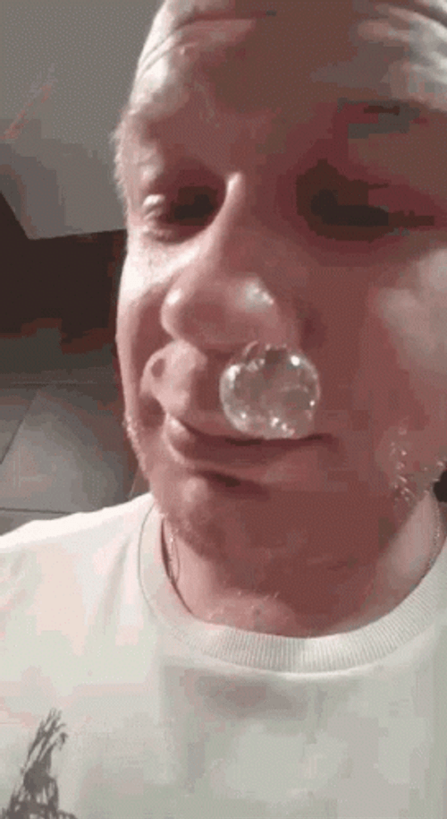 Funny Laughing Man Bubbling Nose GIF