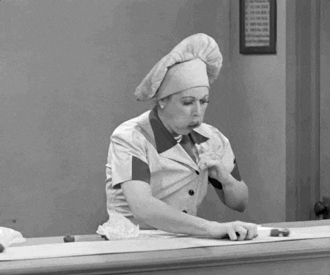 Funny Lucille Ball Hoarding Chocolates GIF