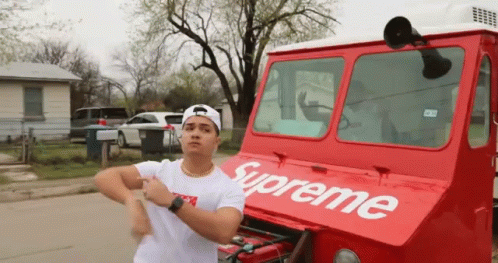 Funny Man Dancing Beside Supreme Delivery Truck GIF
