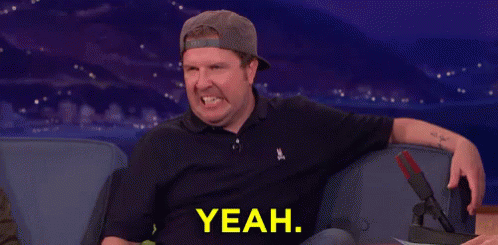Funny Man On Couch With Microphone Saying Yeah GIF
