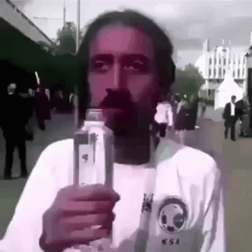 Funny Meme Shivering Guy While Drinking GIF